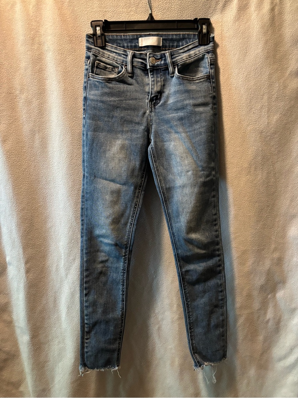 Women’s Light Blue Skinny Jeans with Frayed Hem